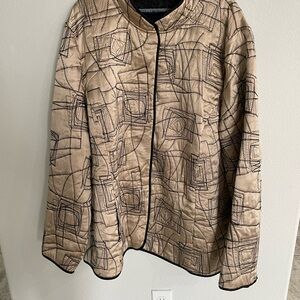 Copper and black reversible light jacket.